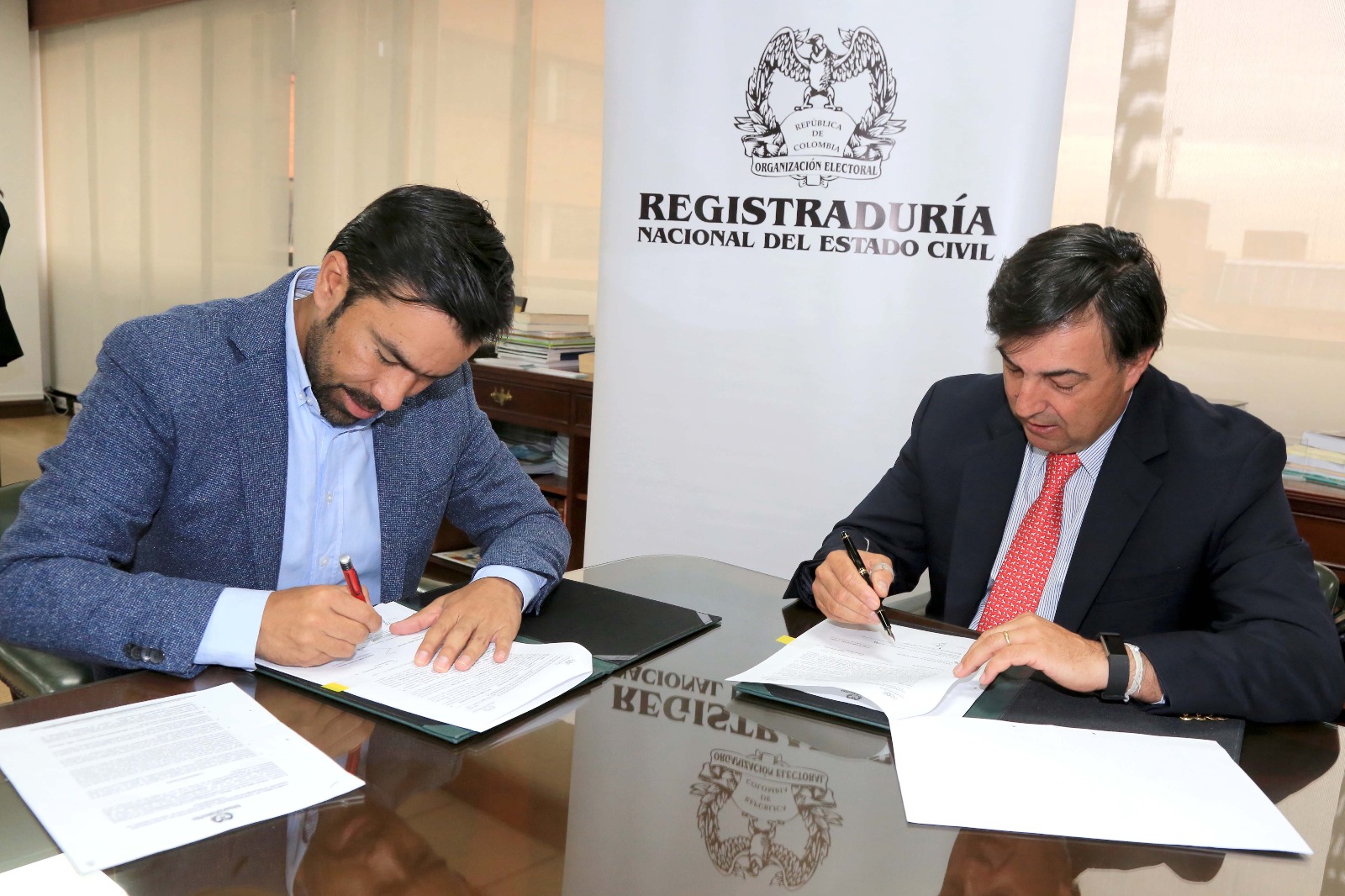 Firman Convenio interadministrativo de cooperación con la Registraduría Nacional 


